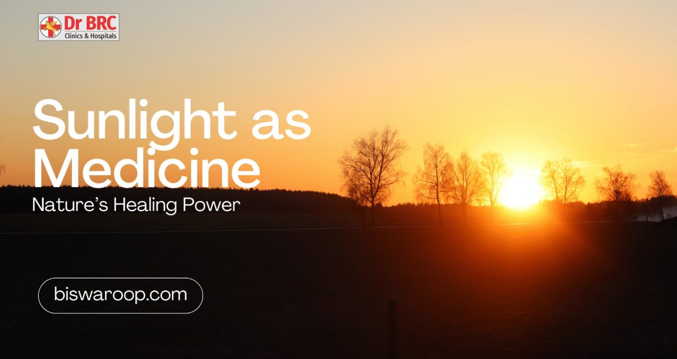 Sunrise over trees with text “Sunlight as Medicine – Nature’s Healing Power” by Dr. BRC Clinics & Hospitals, promoting natural healing through sunlight on biswaroop.com